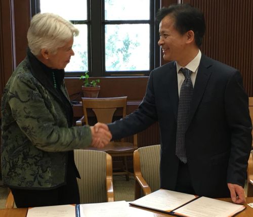 EVCP Christ and President Zhong sign the agreement