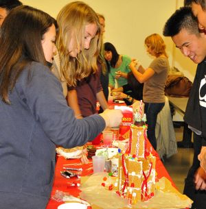 Students building gingerbread houses