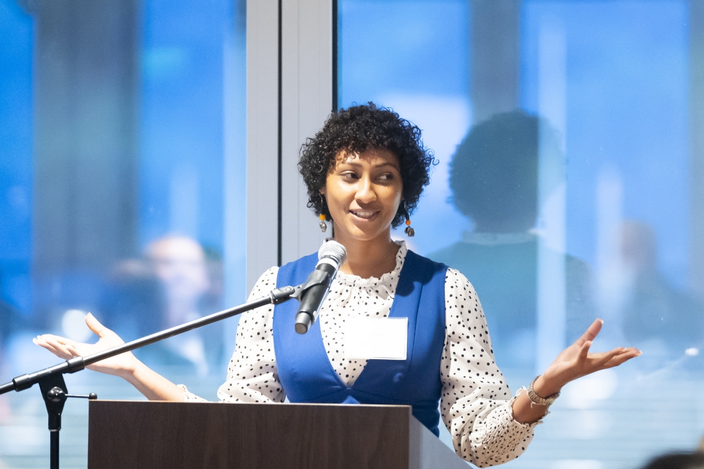 Following dessert, (CEE)² Staff Director Nia Jones spoke about initiatives, events, and volunteer opportunities led by the Civil & Environmental Engineering Community Engaged Education Program over the past year. (Photo Credit: Adam Lau/Berkeley Engineering)