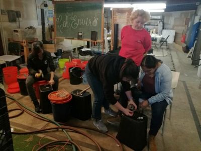 Jocelyn Tsai, Natalie Fedorova, Sam Good, and Meera Kota discuss the most efficient way to puncture drainage holes