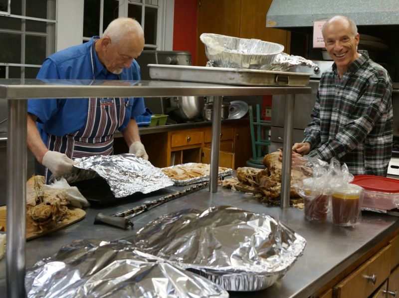 Two faculty members in the kitchen