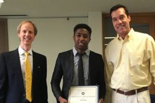 Olujimi Ajayi presented John C. Shimmick Scholarship by Chair Rob Harley (left) and Shimmick Construction CEO (right)